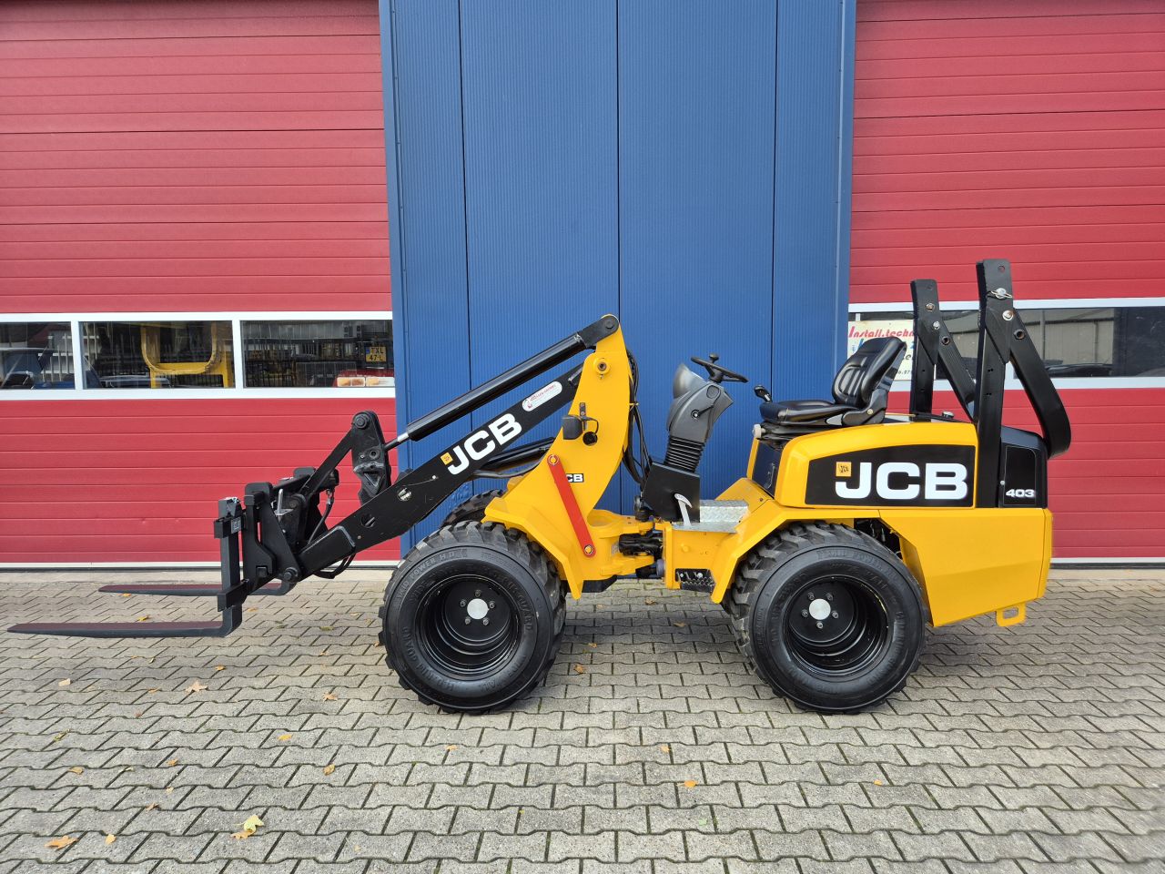 JCB 403 WLS SHOVEL BOUWJAAR 2011 MET 2160 UUR