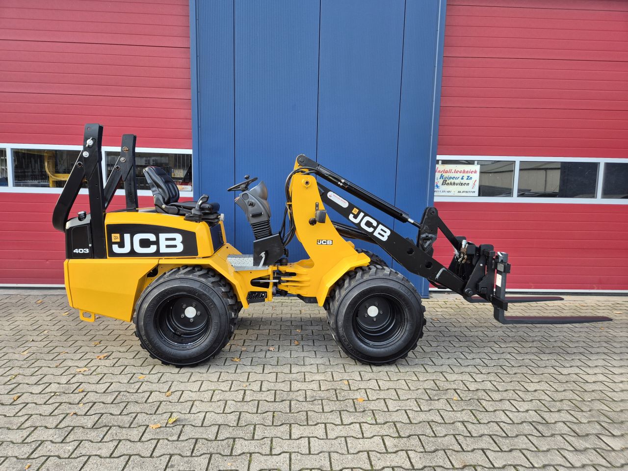 JCB 403 WLS SHOVEL BOUWJAAR 2011 MET 2160 UUR