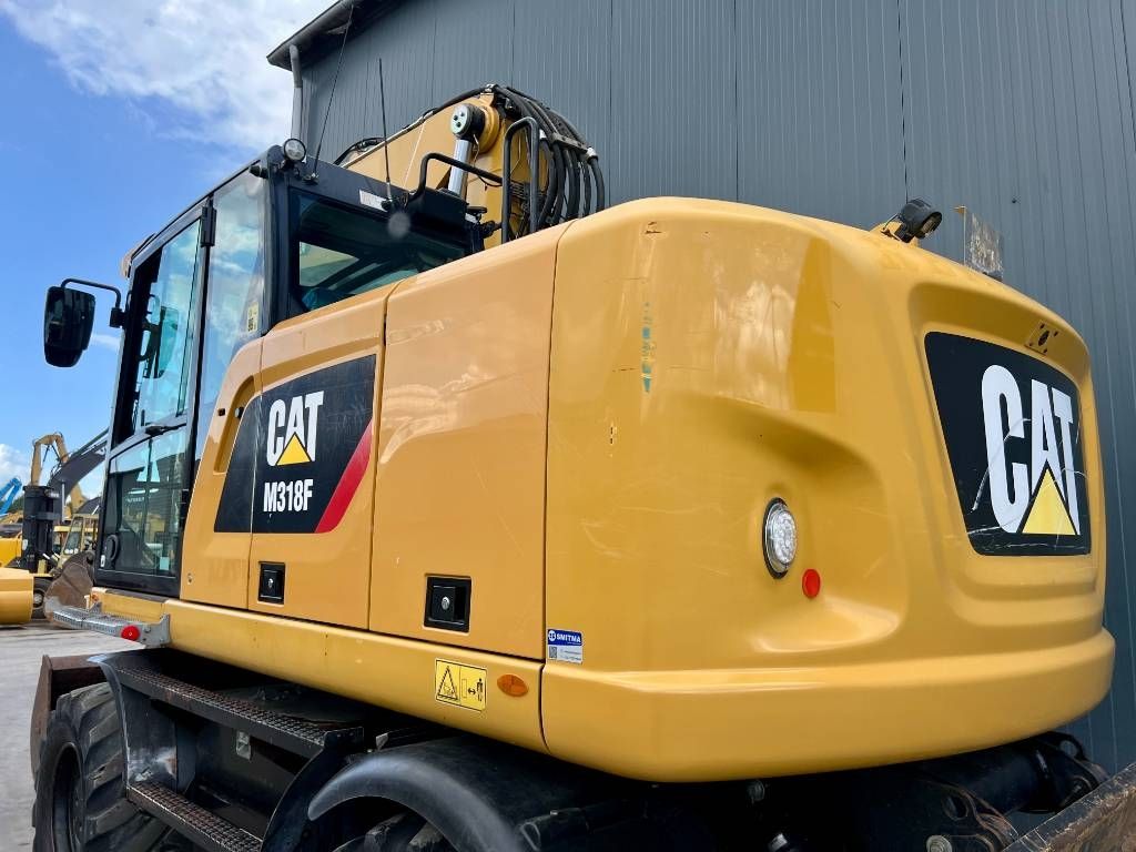 CAT M318F