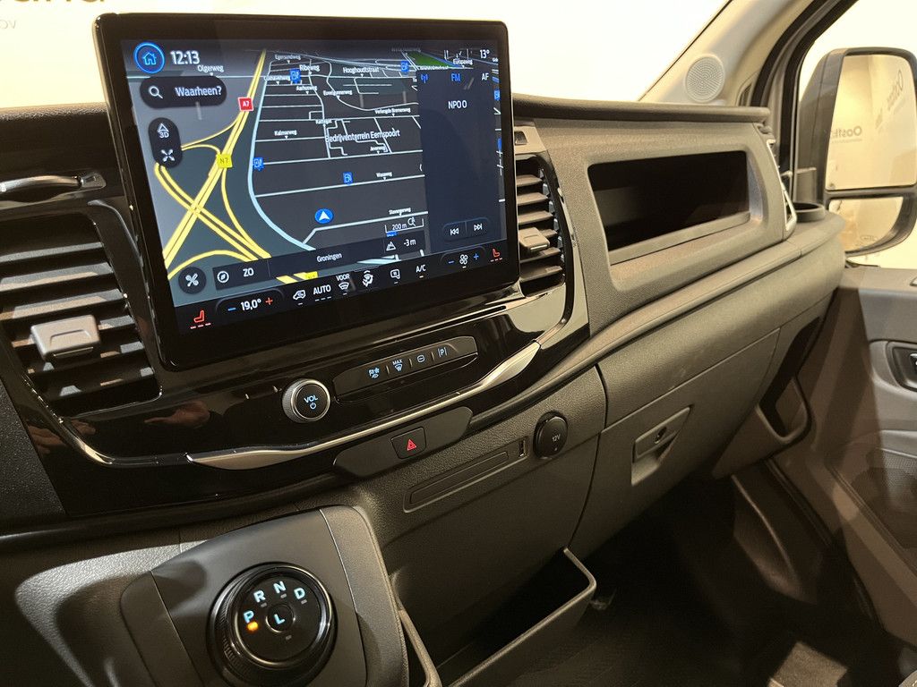 Ford E-Transit L2H2 Trend 68 kWh 184 PK / 100% Elektrisch !! / Airco / Cruise Control / CarPlay / Camera / Navigatie / 3-Zits / 12.300 KM !!