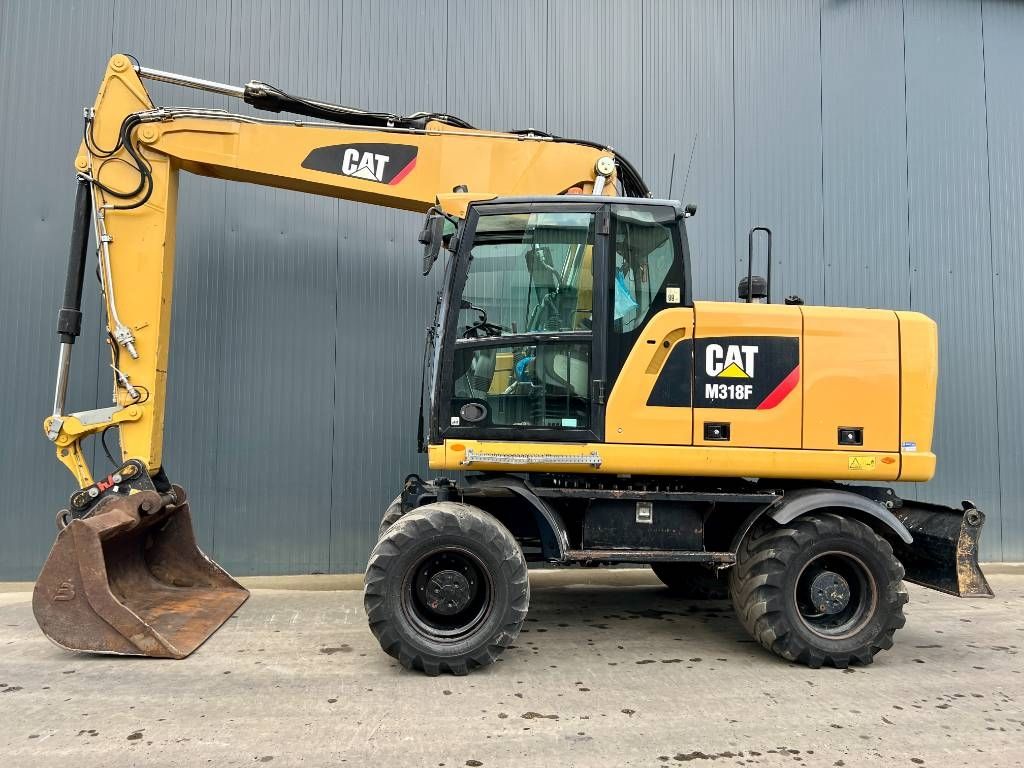 CAT M318F
