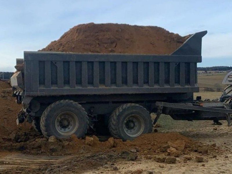 Pronar T 286 mit Abrollmulde