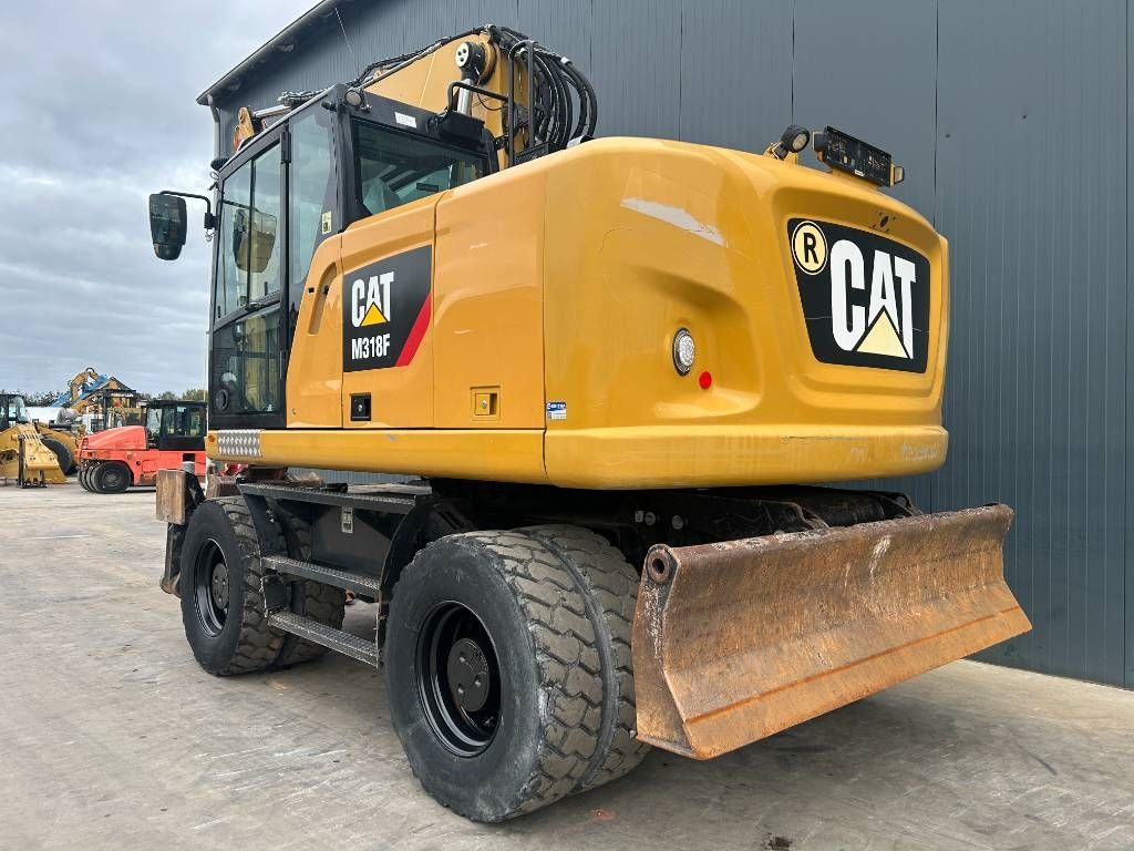 CAT M318F