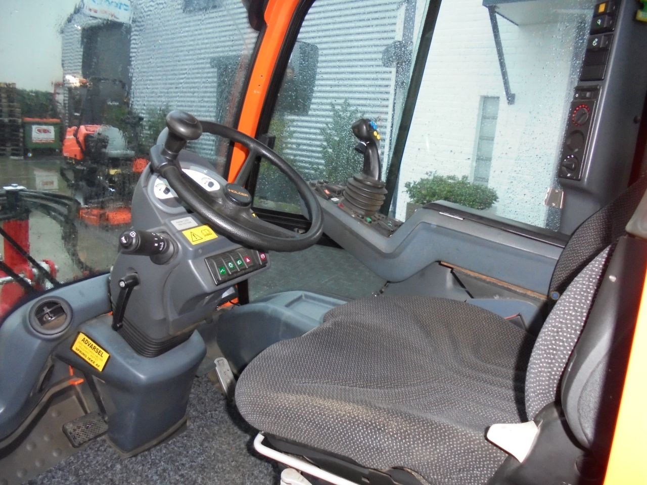 Holder C250 met onkruidborstel