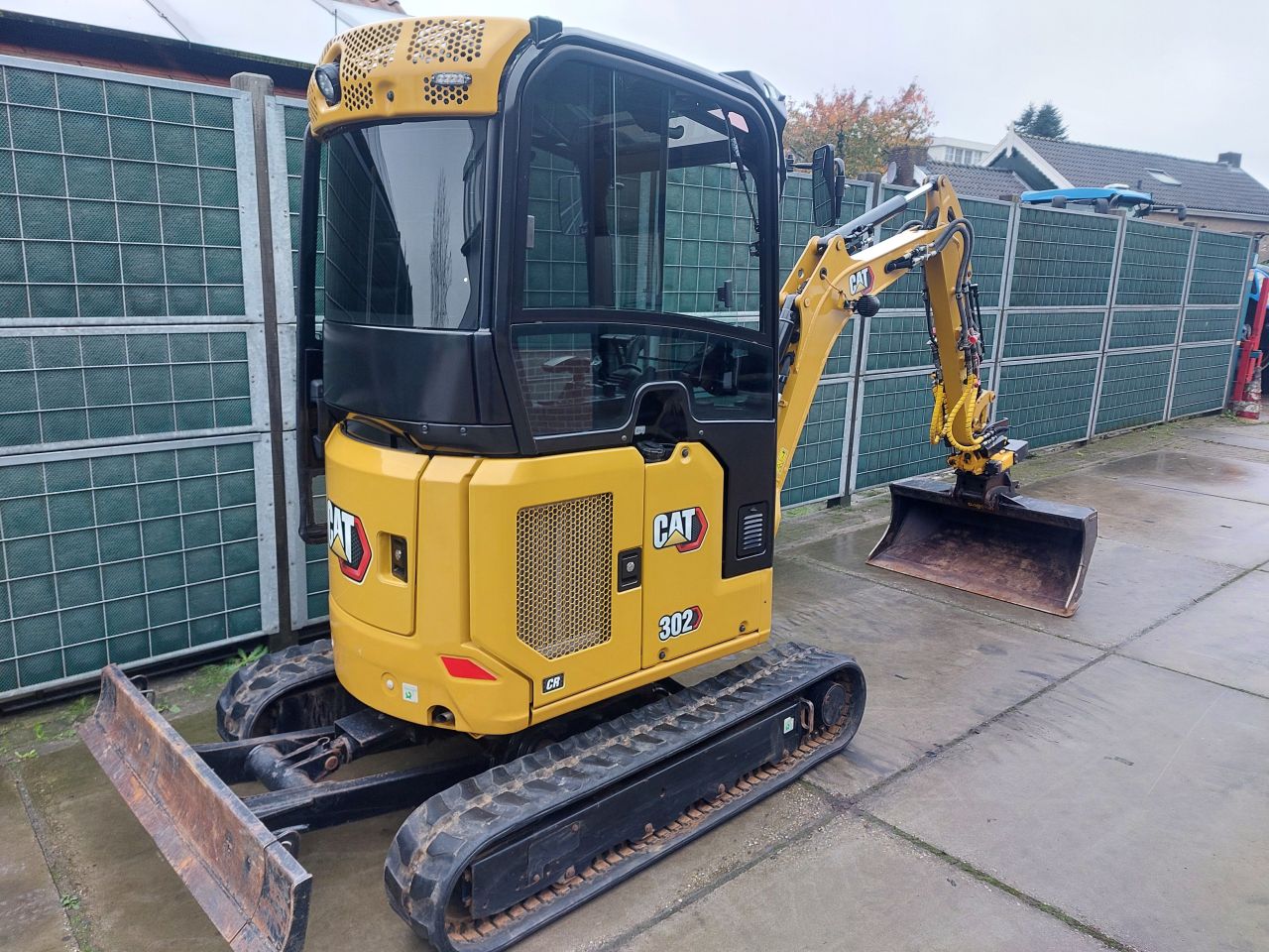 Caterpillar 302 CR minigraver met Engcon draai/kantelstuk