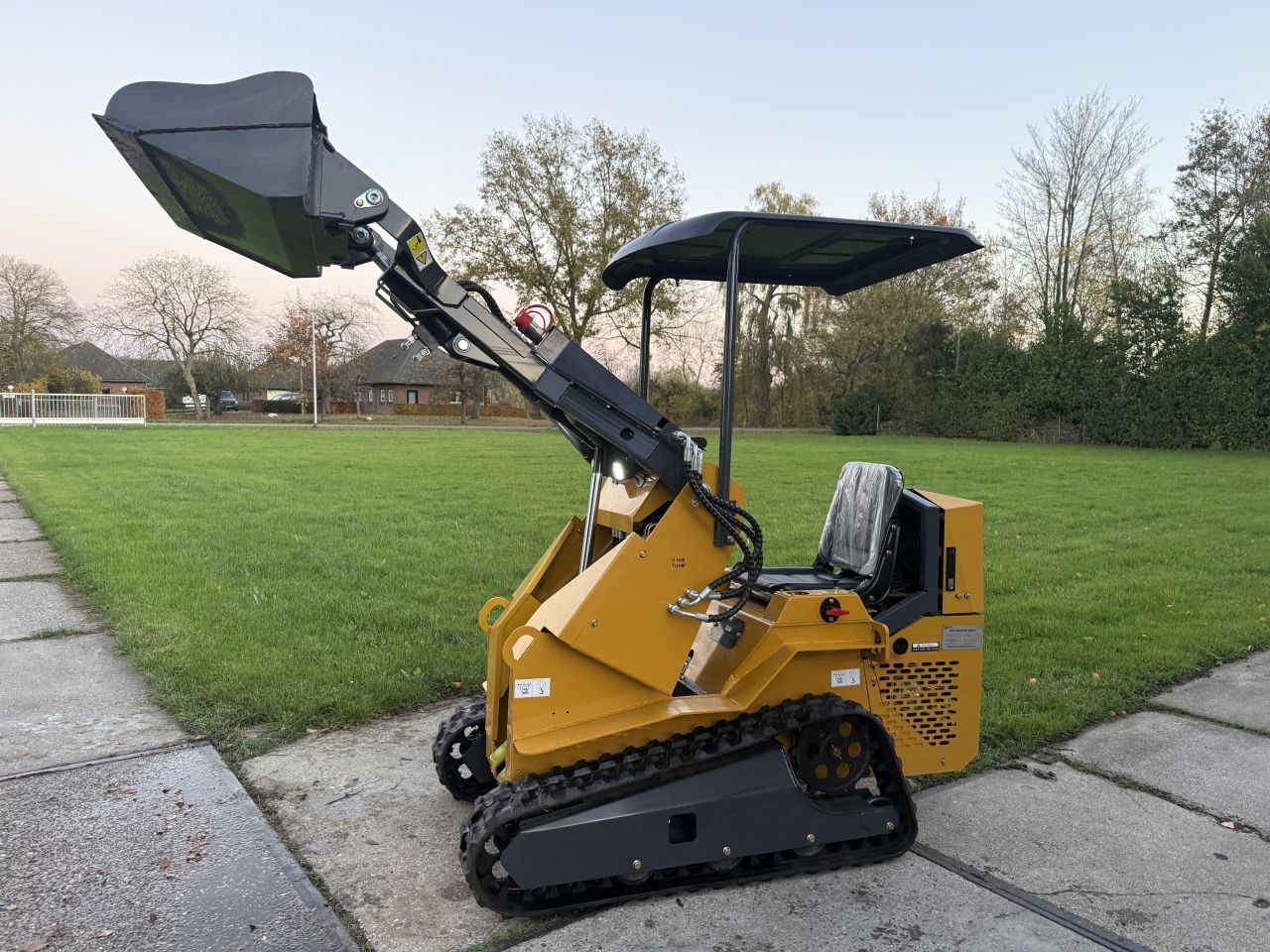 Nieuwe Skidster schranklader op rupsen + extra hydrauliek