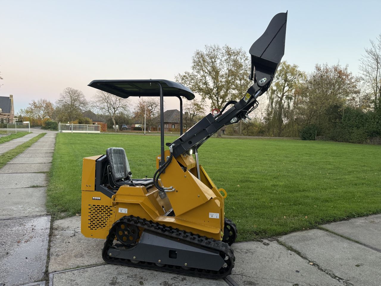 Nieuwe Skidster schranklader op rupsen + extra hydrauliek