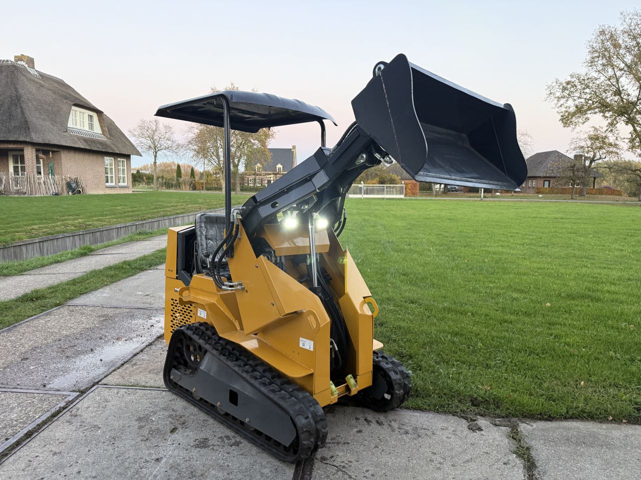 Nieuwe Skidster schranklader op rupsen + extra hydrauliek