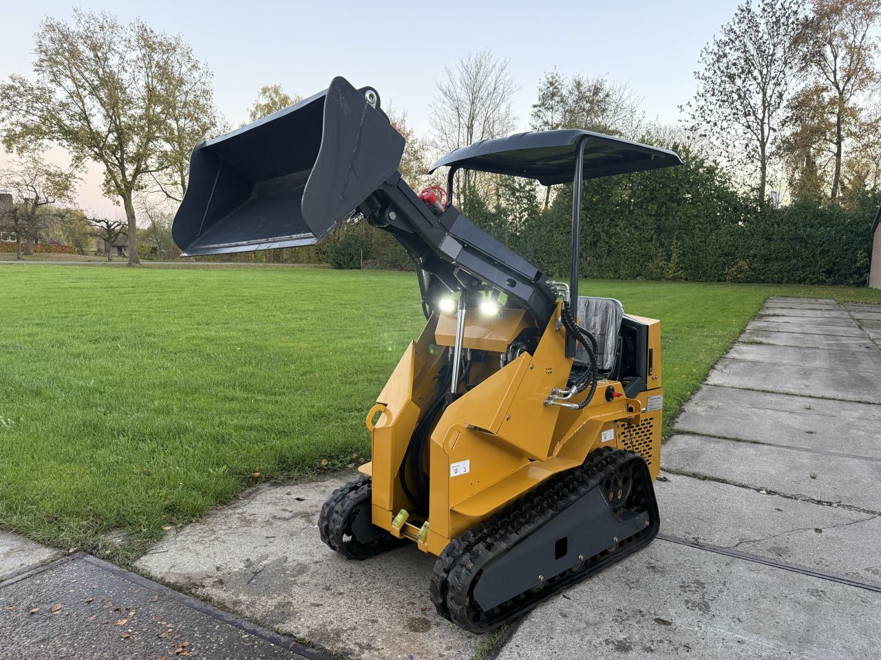 Nieuwe Skidster schranklader op rupsen + extra hydrauliek