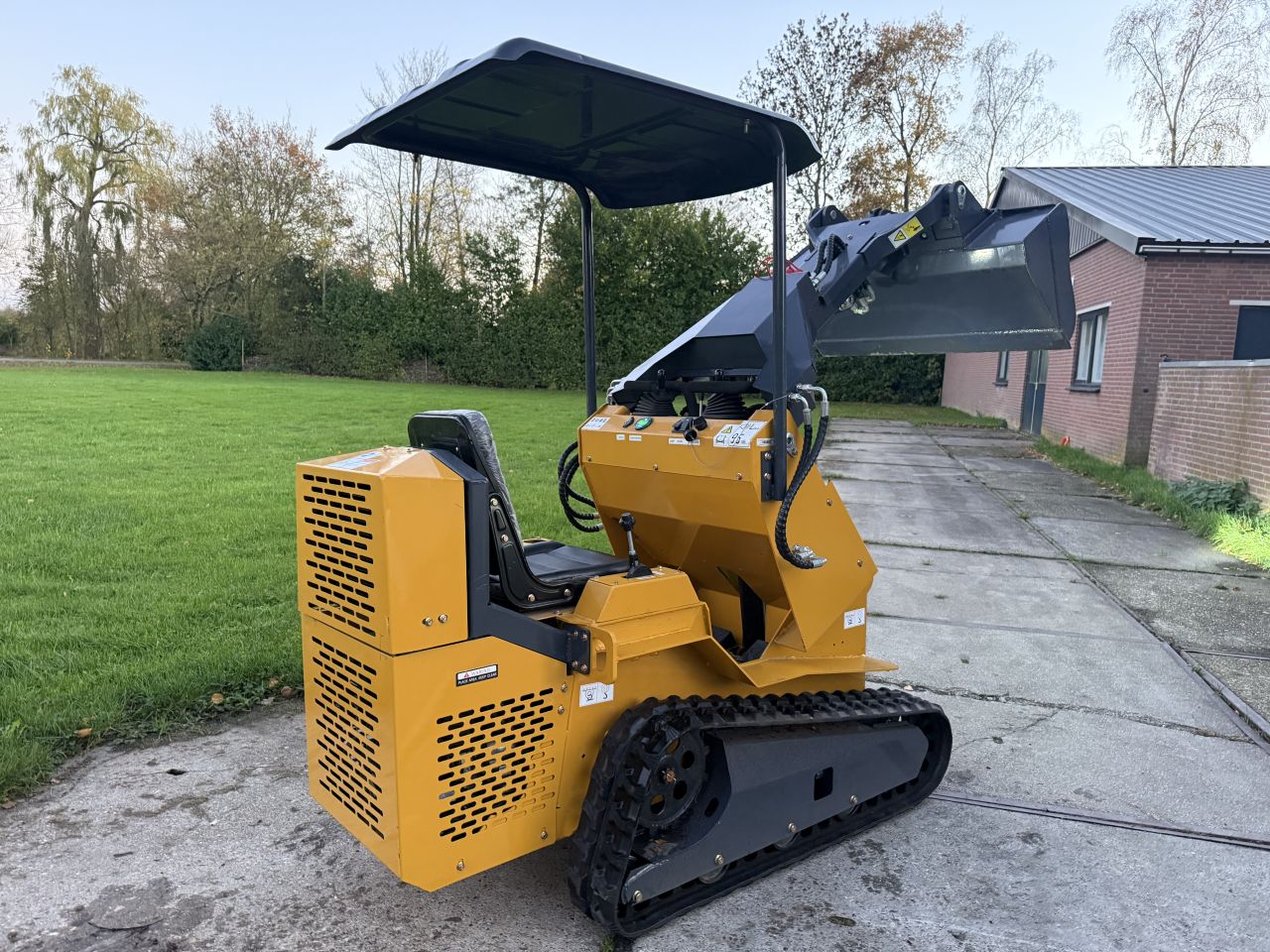 Nieuwe Skidster schranklader op rupsen + extra hydrauliek