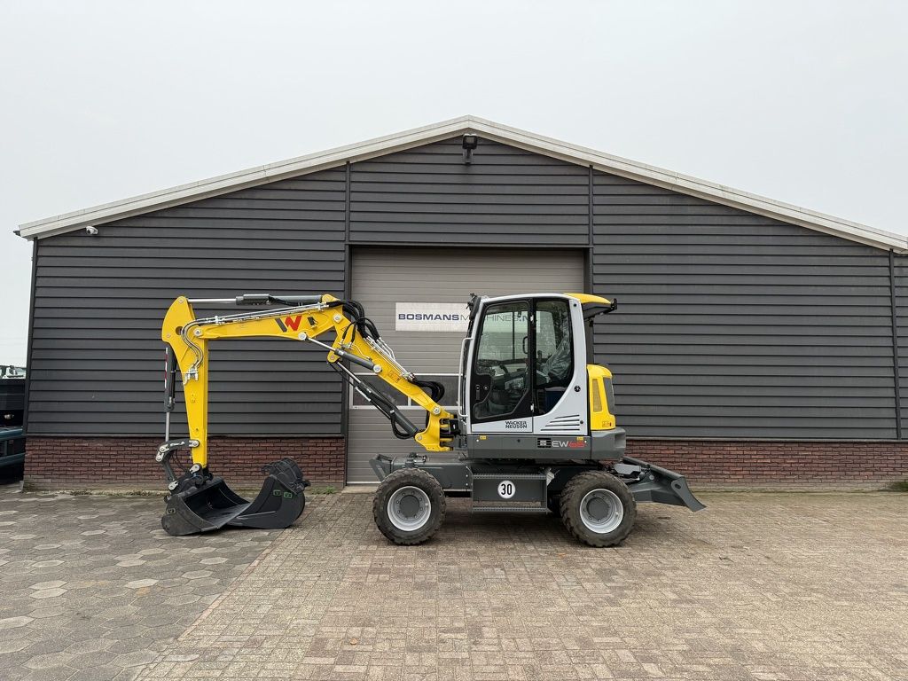 TE HUUR: Neuson EW65 mobiele graafmachine 7.2 T