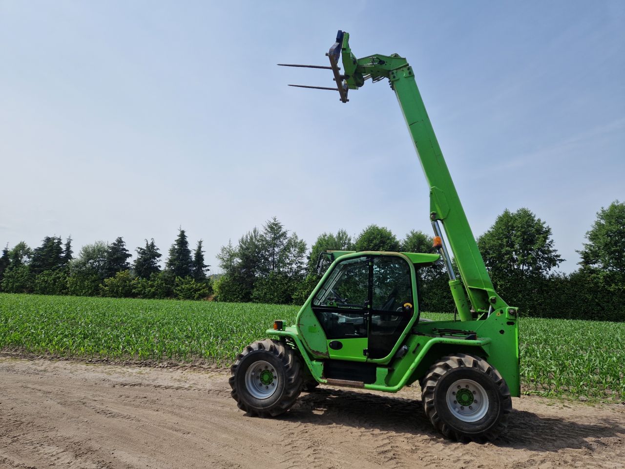 Verreiker merlo telescoop lader 4x4 manitou