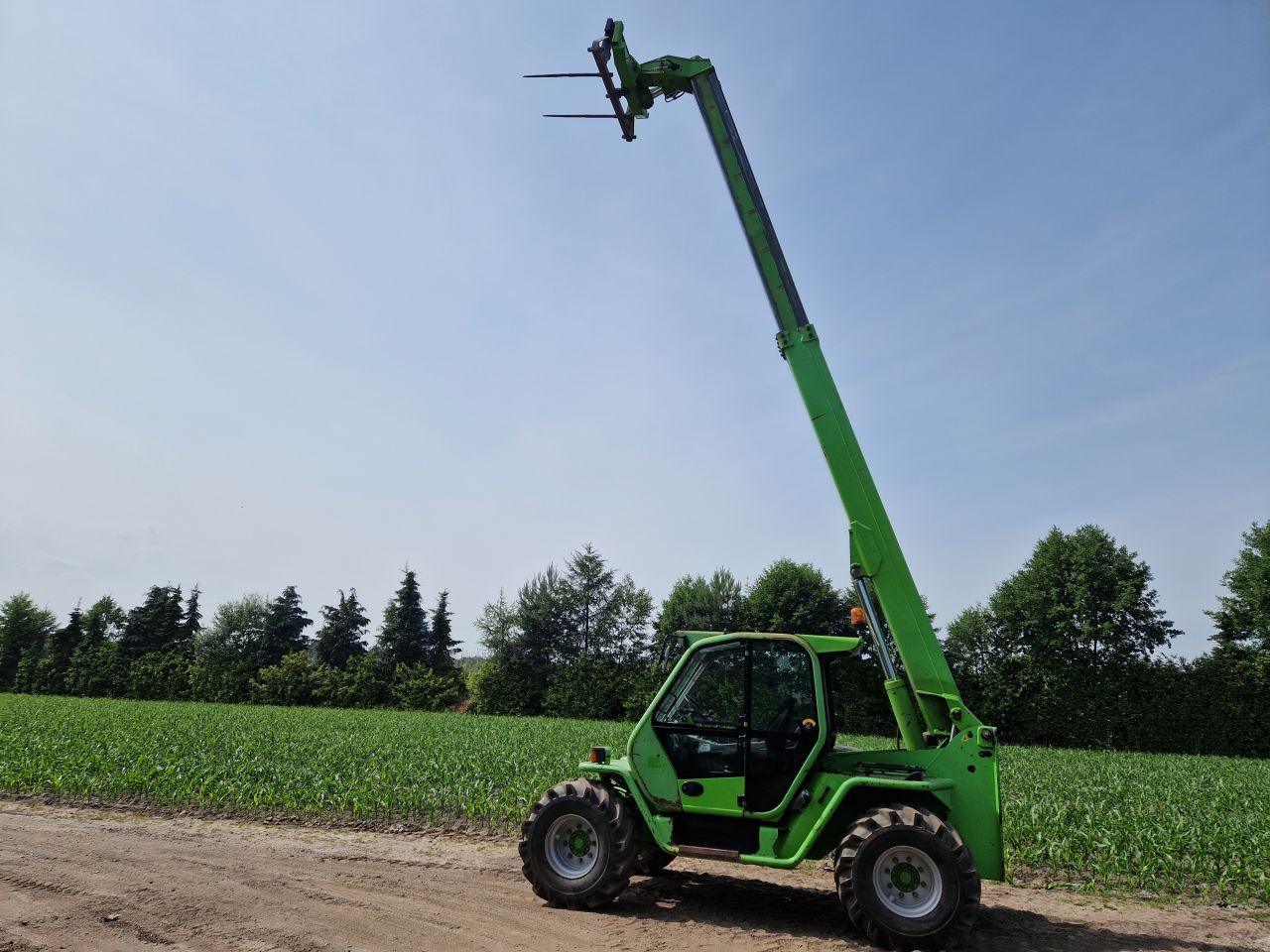 Verreiker merlo telescoop lader 4x4 manitou