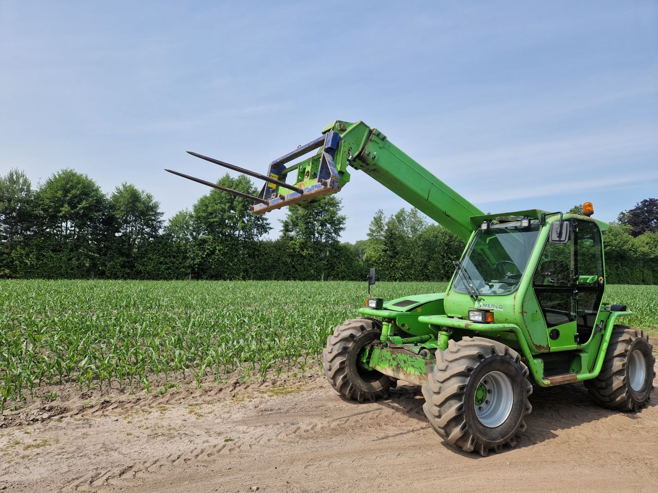 Verreiker merlo telescoop lader 4x4 manitou
