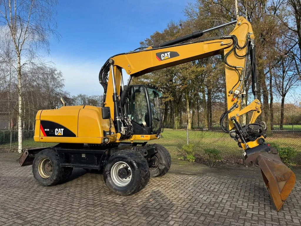 Caterpillar M313D Mobiele kraan