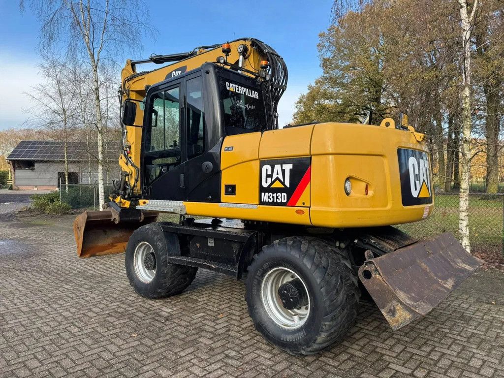 Caterpillar M313D Mobiele kraan