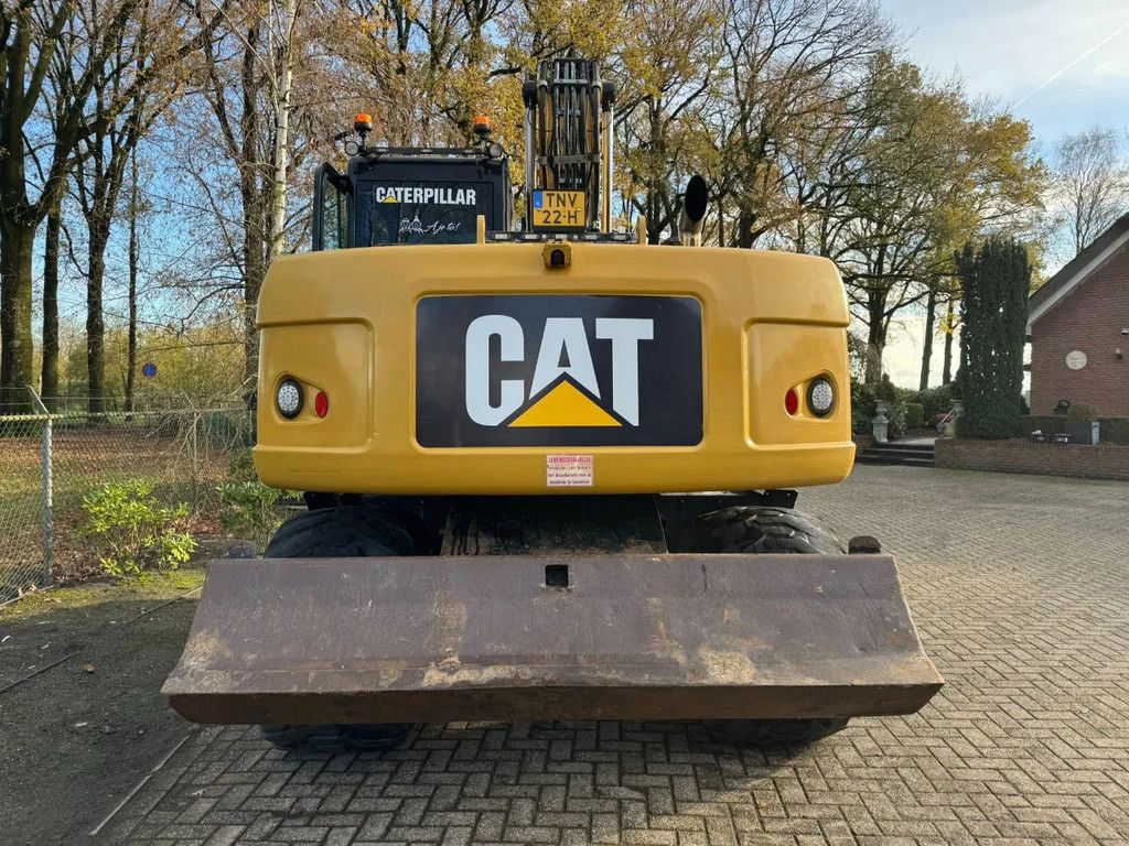 Caterpillar M313D Mobiele kraan
