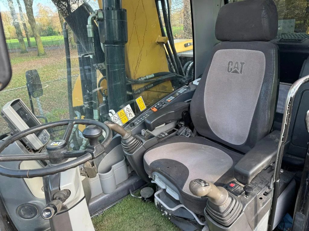 Caterpillar M313D Mobiele kraan