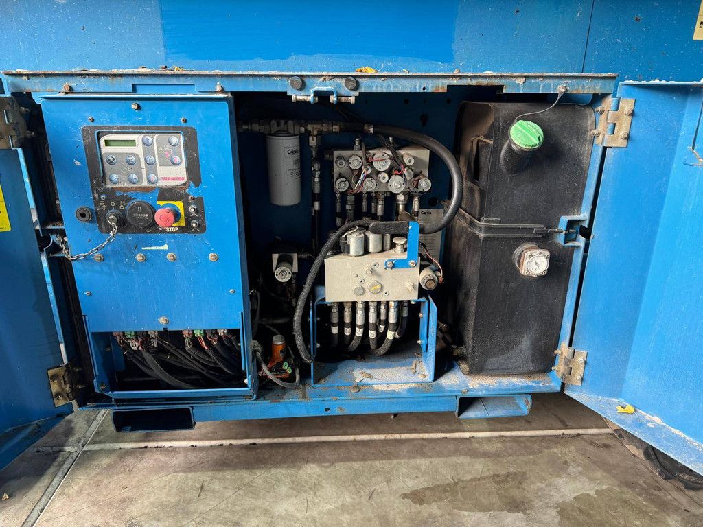 Scissor lift Genie GS-4069 RT Diesel 14.30m 2012