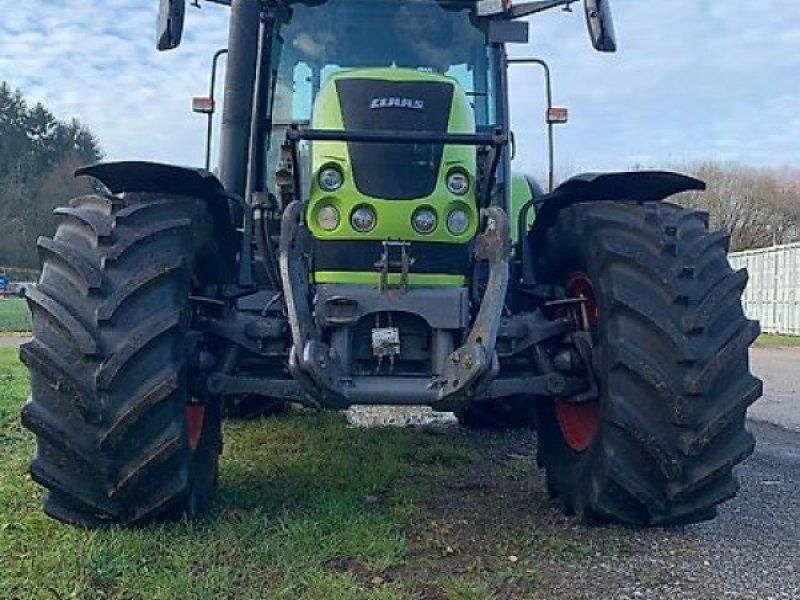 Claas ARES 697 ATZ mit Fronthydraulik und Frontladerkonsolen Stoll