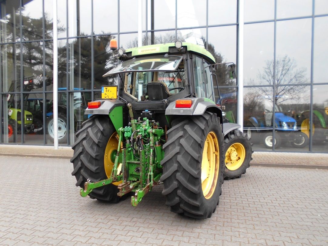 John Deere 6410 + fronthef en PTO