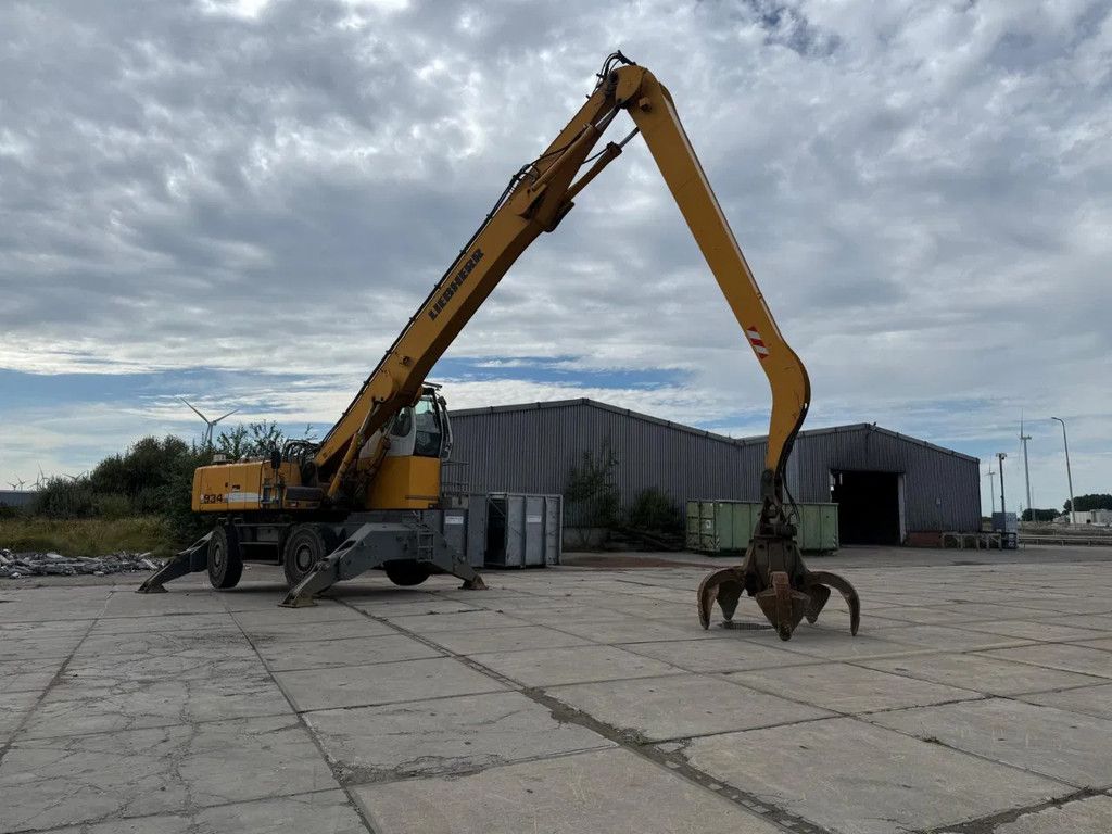 Liebherr A 934 C-HD Litronic inclusief poliep grijper