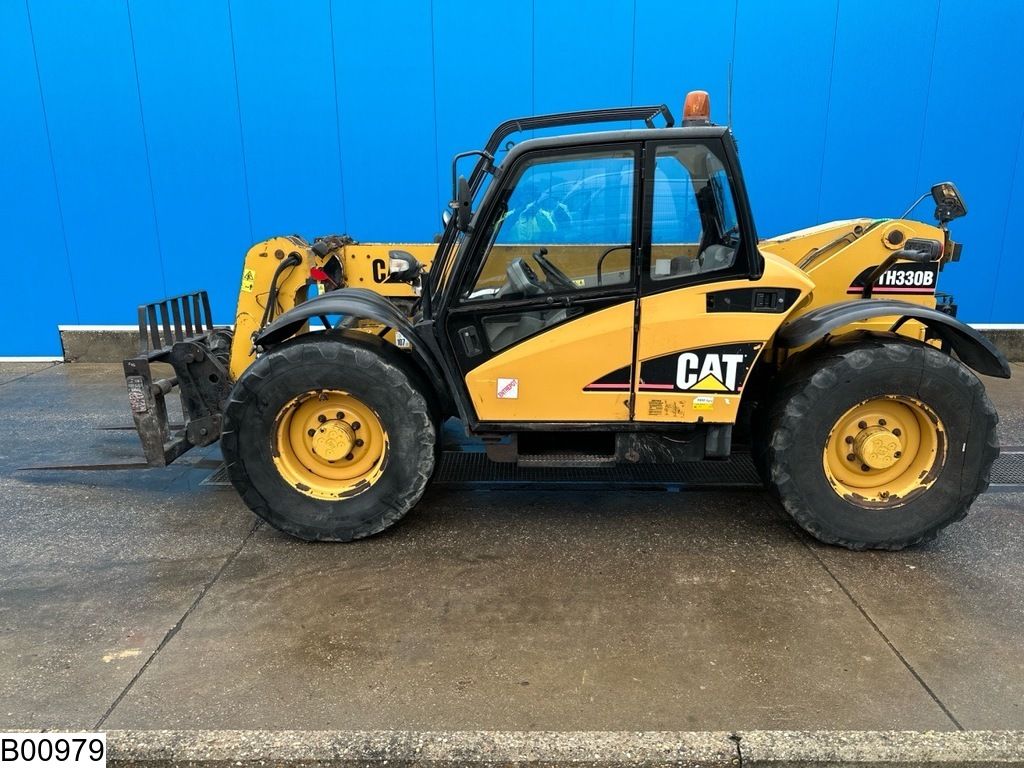Caterpillar TH 330b 7,20 MTR, 3175 KG