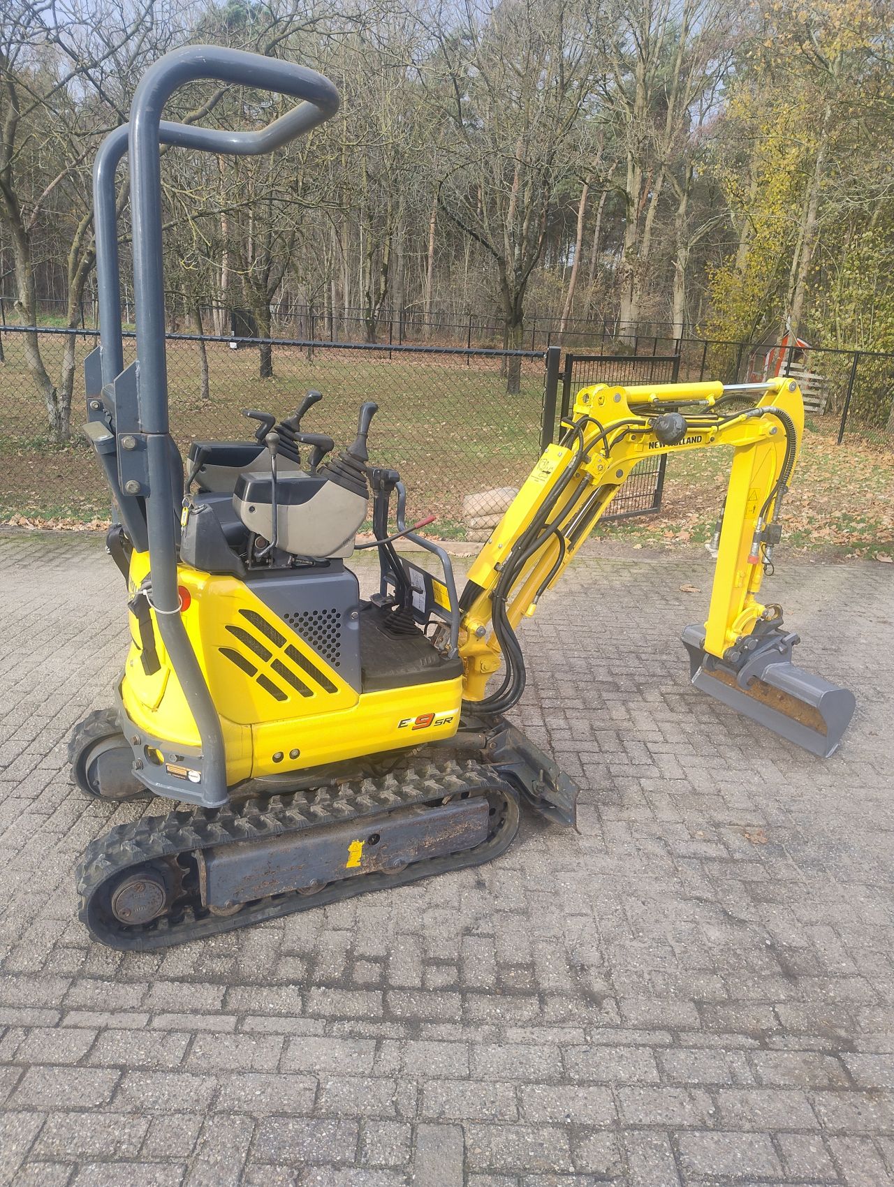 New holland minigraver kobelco e09 sr marge