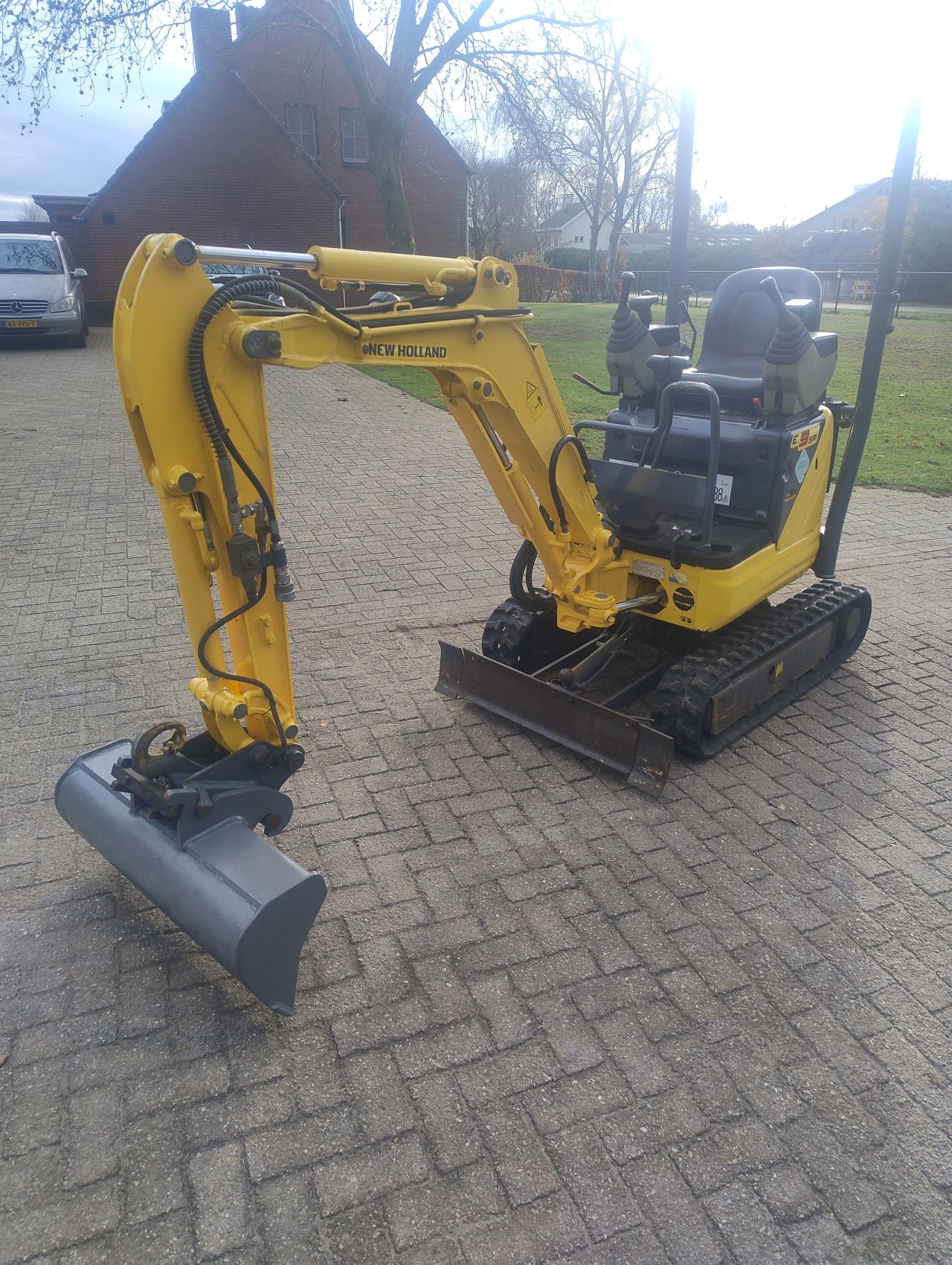 New holland minigraver kobelco e09 sr marge