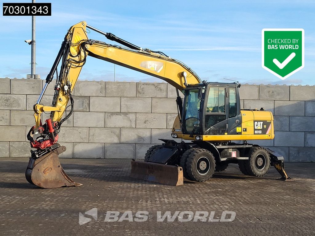Caterpillar M315 D OUTRIGGERS + BLADE