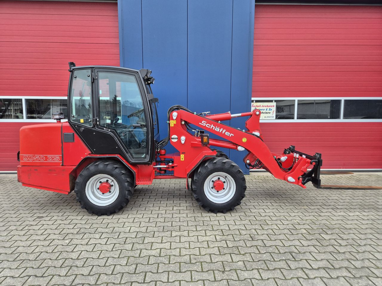 SCHAFFER 5050ZS SHOVEL MET CABINE EN KUBOTA 60PK