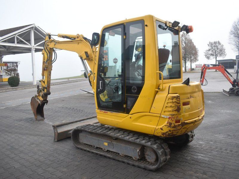 Takeuchi TB235 mit Powertilt