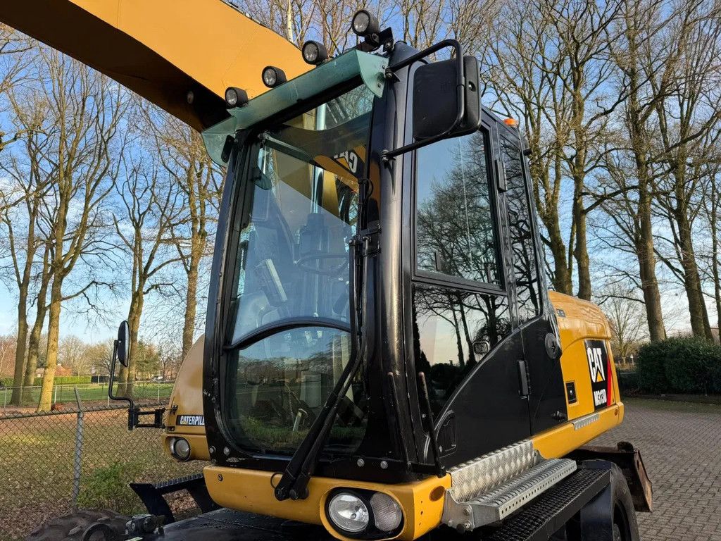 Caterpillar M313D Mobiele kraan