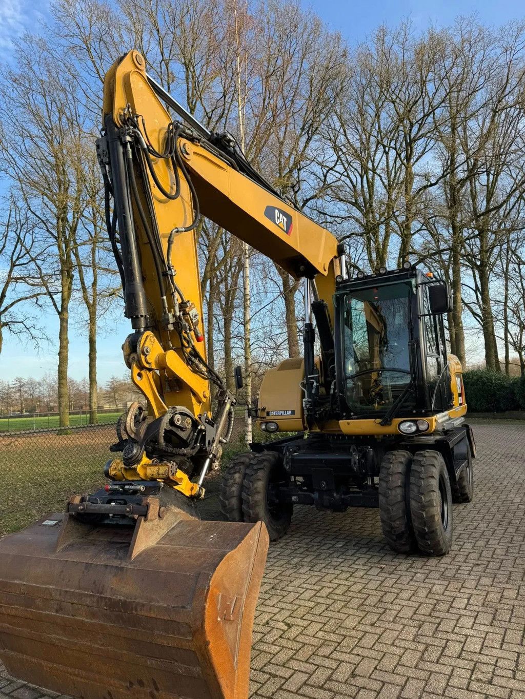 Caterpillar M313D Mobiele kraan