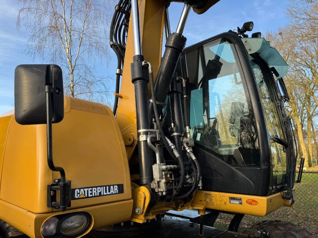 Caterpillar M313D Mobiele kraan