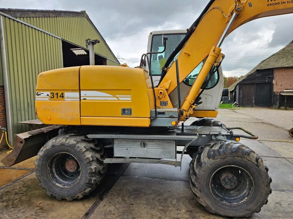 Liebherr A 314 mobiele graafmachine bandenkraan mobil bagger