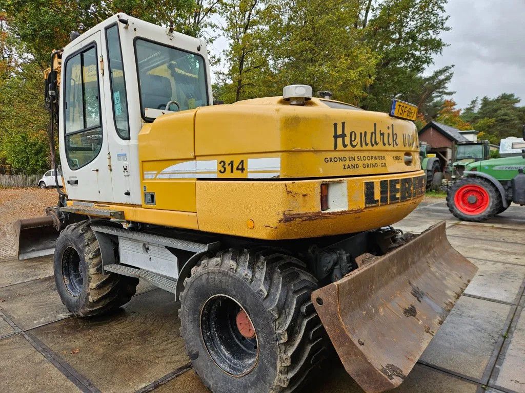 Liebherr A 314 mobiele graafmachine bandenkraan mobil bagger