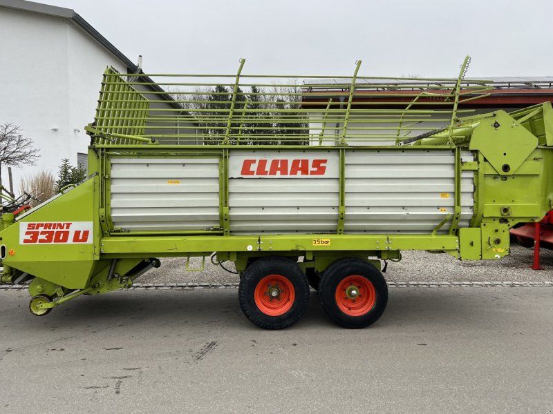 Claas Sprint 330 U Tandem mit drei Dosierwalzen