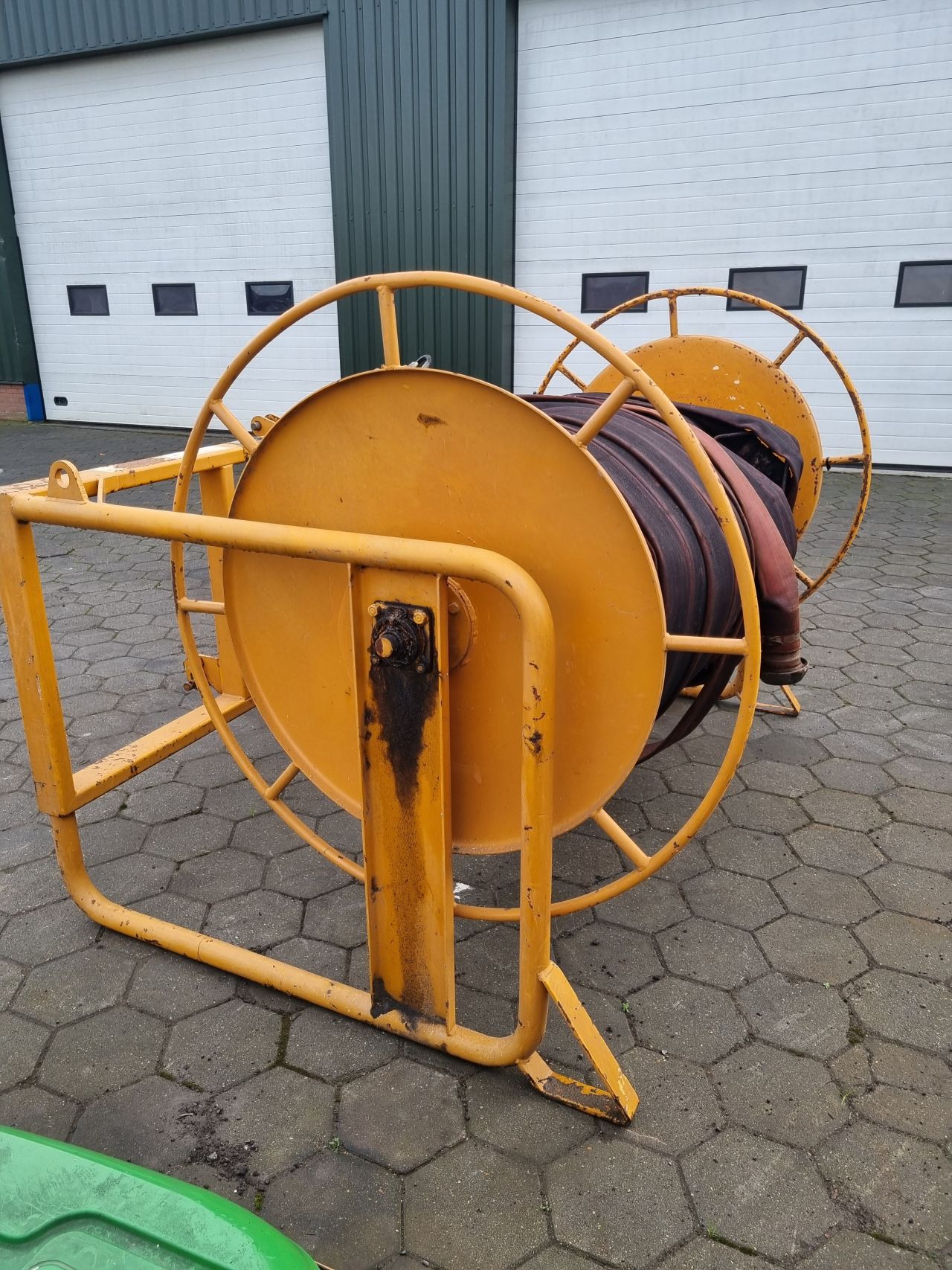 Veenhuis slangenhaspel met 400 meter Baars beregeningslang.