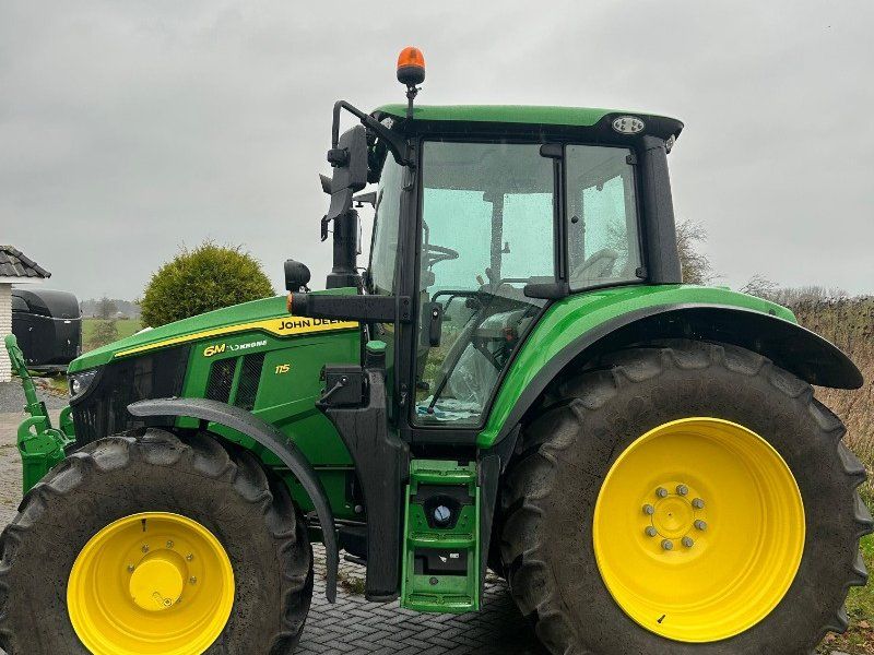 John Deere 6M 115