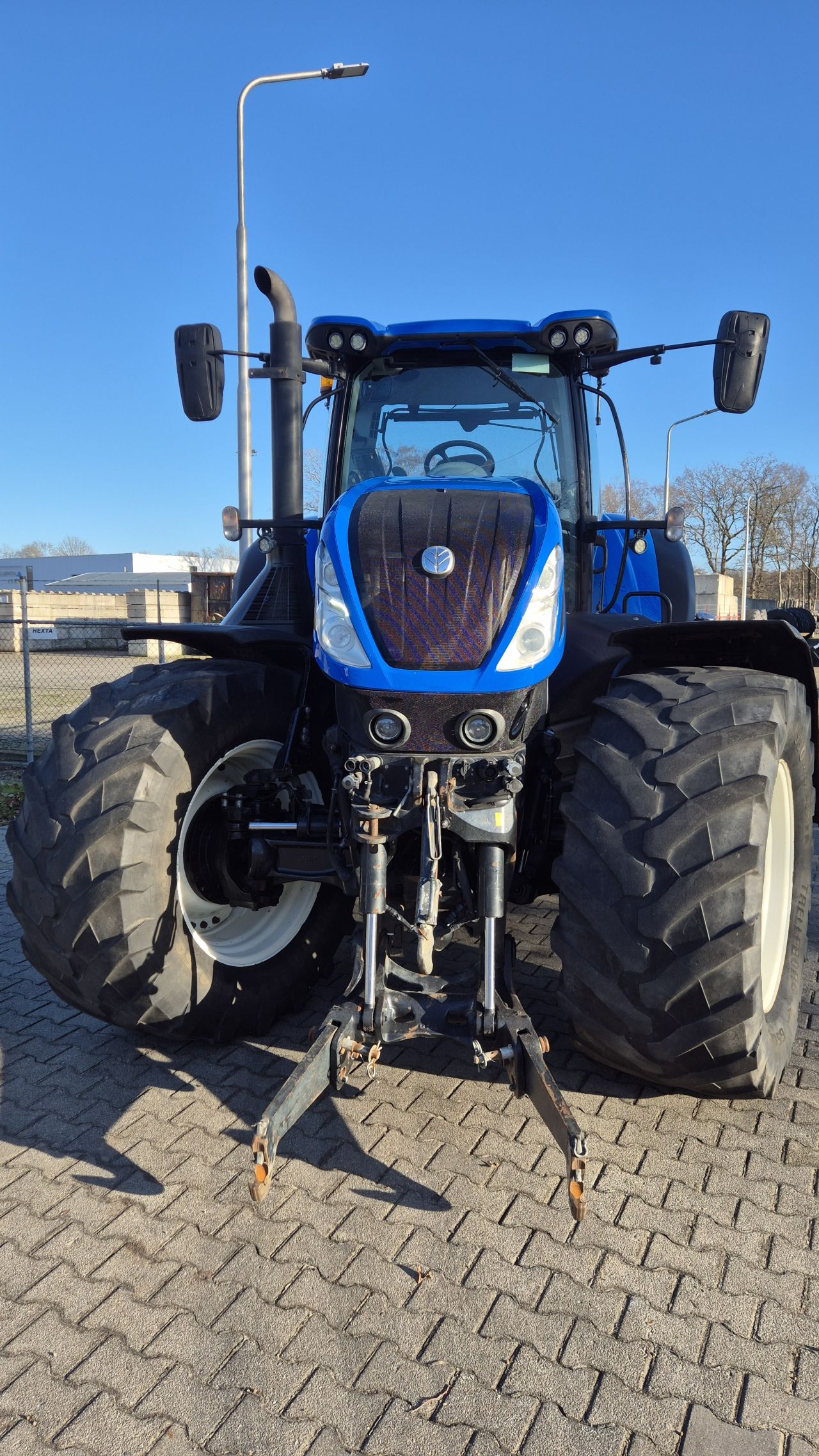 New Holland T7.315 HD AC 40Kmh. Fronthef en Lucht.