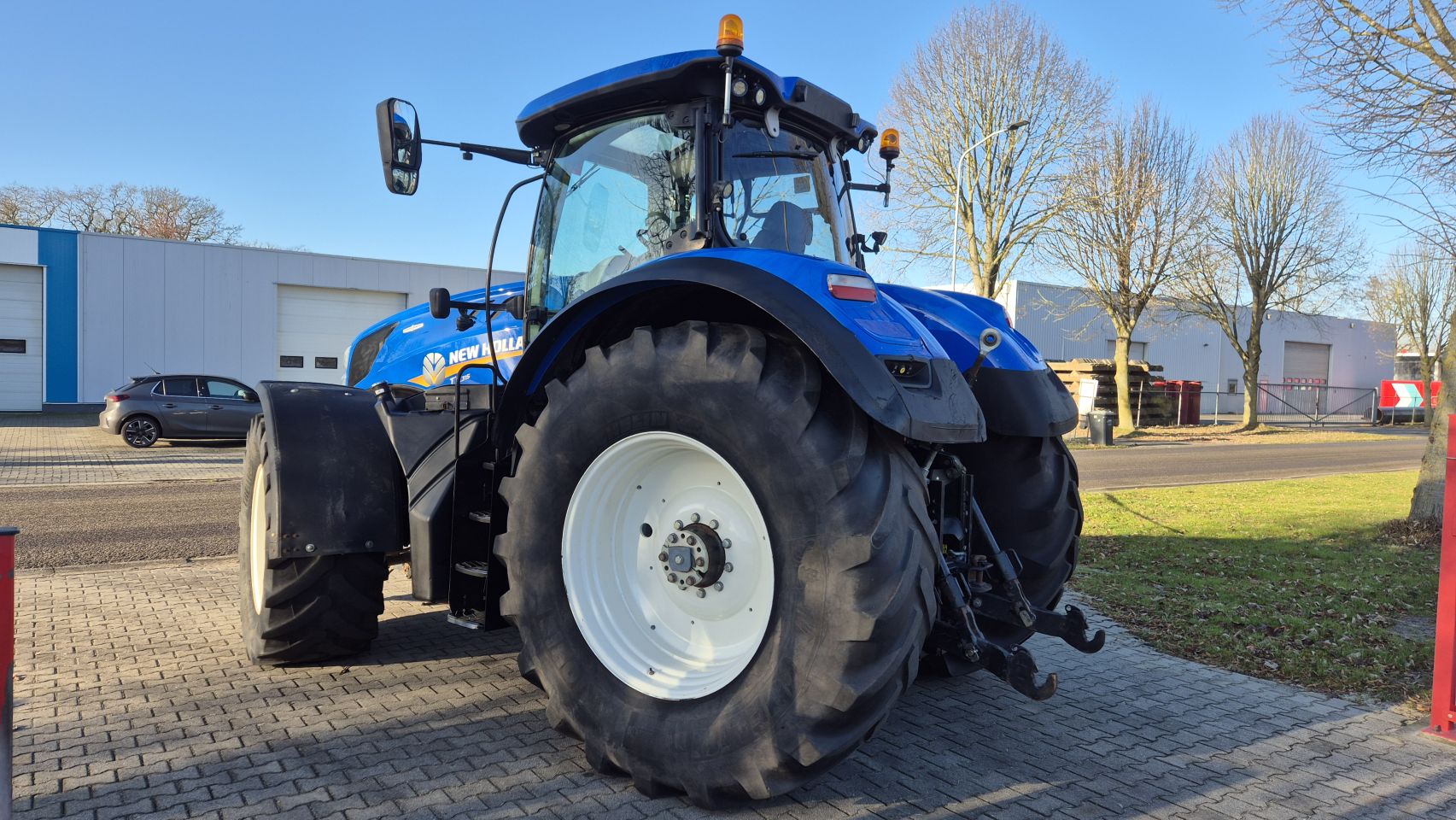 New Holland T7.315 HD AC 40Kmh. Fronthef en Lucht.