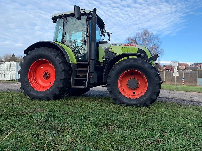 Claas ARES 697 ATZ mit Fronthydraulik und Frontladerkonsolen /MX