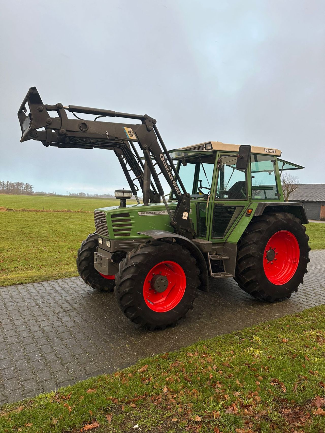 Fendt Farmer 308 Econ met Quicke 620 voorlader