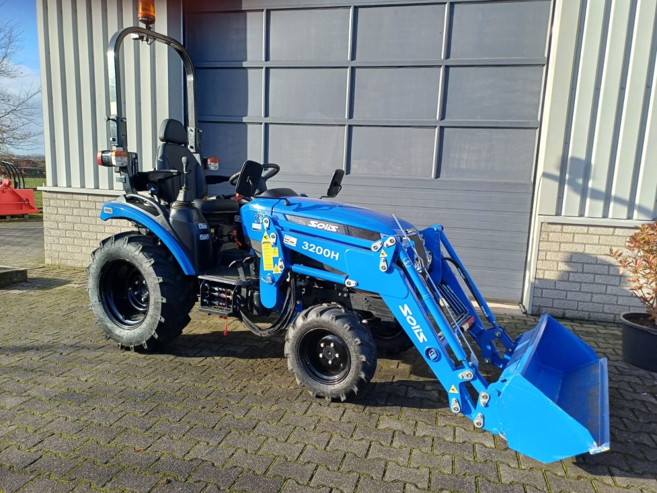 Gebruikte Solis H26 met frontlader | Marge prijs | mini tractor