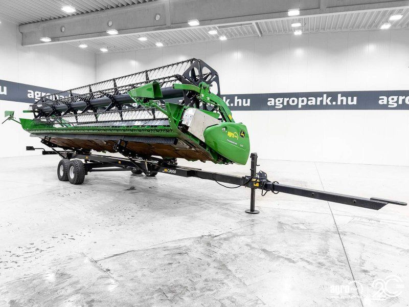 John Deere 630PF 9.15m draper header with tandem axle trailer and 2 rapesee