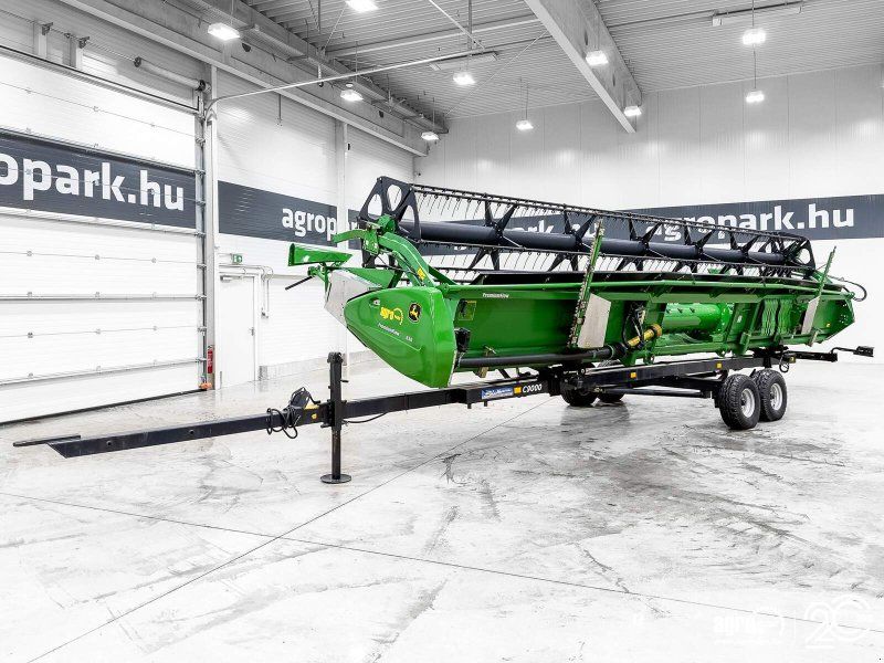 John Deere 630PF 9.15m draper header with tandem axle trailer and 2 rapesee