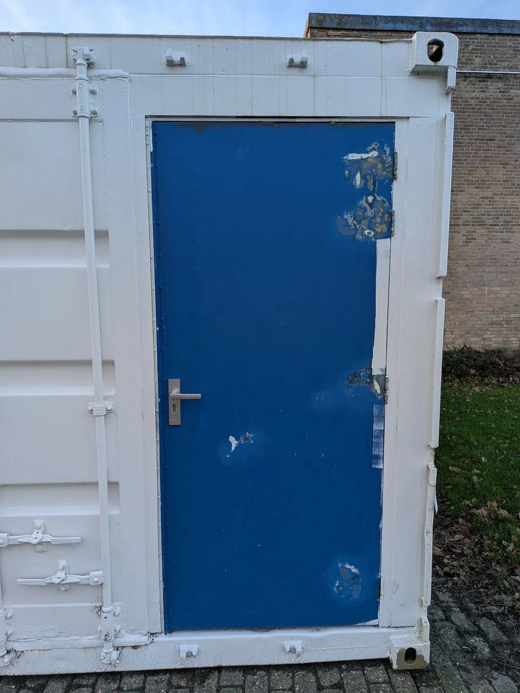 20-voet zeecontainer met loopdeur -