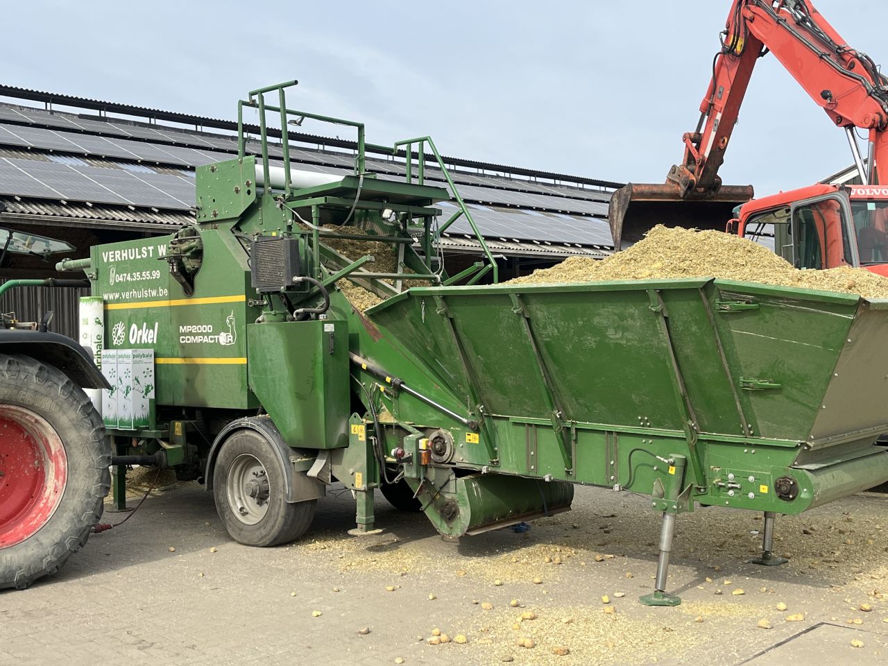 Compost strooier en maispers