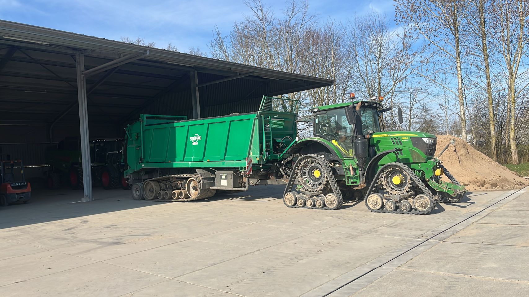 Compost strooier en maispers